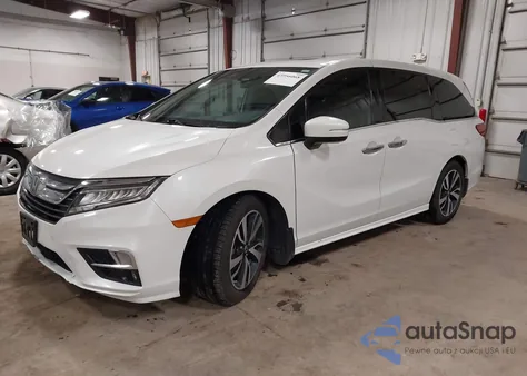 2020 Honda Odyssey Elite z USA, uszkodzony, nr VIN 5FNRL6H97LB016237